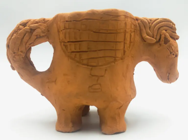 Slava Romanenko’s ceramic work “Horse-Shaped Cup” with a saddle and a handle formed as a tail.